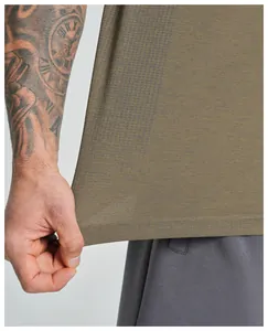 Detailed macro shot of olive green seamless quick-dry breathable sports tank top fabric