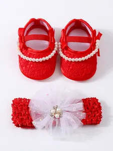 Infant red lace princess shoes with pearl bow and matching white floral headband set