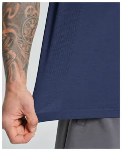 Close-up detail of navy blue seamless breathable fabric on men's quick-dry sports vest