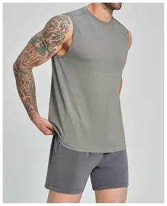 Detail view of men's gray seamless sports tank top showing breathable mesh texture.