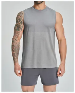 Close-up detail of grey seamless athletic tank top showing breathable mesh texture