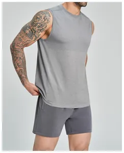 Macro detail of grey seamless men's sports tank top showing breathable mesh texture for gym