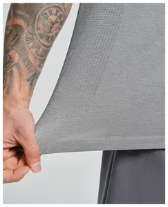 Close-up of grey seamless sports tank top showing breathable mesh and elastic fabric texture