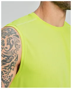 Close-up of breathable neon green mesh fabric on men's athletic sleeveless tank top.