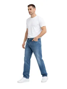 Full-length side view of classic men's loose straight-leg blue jeans worn by a male model.