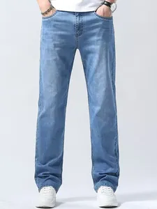 Classic men's light blue straight-leg denim jeans featuring a comfortable loose fit design