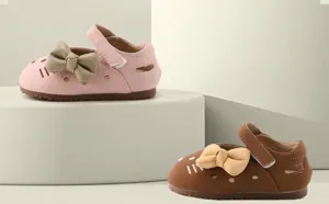 Baby girl walking shoes with cartoon cat whiskers and leather bow in pink and brown