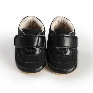 Classic black infant pre-walker sports shoes with velcro straps for baby boys and girls