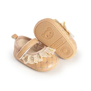 Detailed view of lace baby princess walking shoes with quilted pattern and panda sole