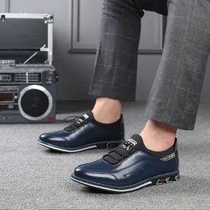 Side view of premium men's navy blue casual leather shoes featuring decorative stitching