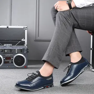 Close-up of stylish dark blue men's casual leather shoes with elastic laces.