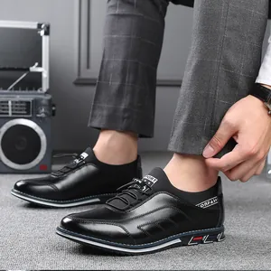 Modern black embroidered slip-on men's casual shoes featuring a stylish color-block sole design