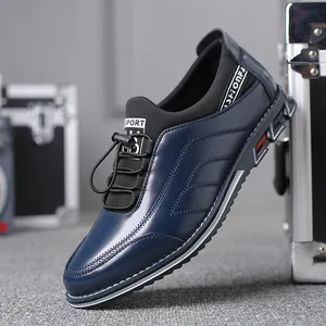 Navy blue men's low-top casual leather shoes with decorative embroidery and elastic laces