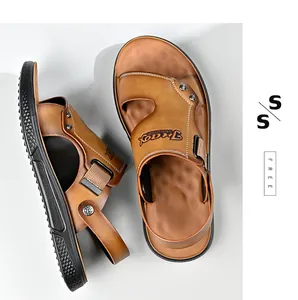 Close-up detail of brown leather men's beach sandals featuring durable non-slip black soles