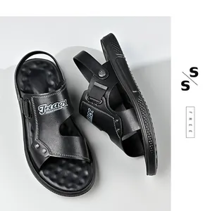 Detailed view of black men's sandals featuring a textured footbed and adjustable straps