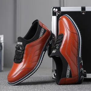 Close-up of brown slip-on leather shoes with decorative stitching and pull-cord laces