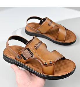 Detailed view of brown men's two-way casual beach sandals with non-slip rubber soles