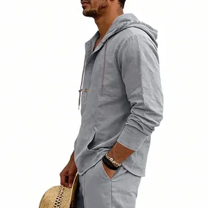 Close-up detail of men's grey breathable linen hooded Henley shirt for casual wear