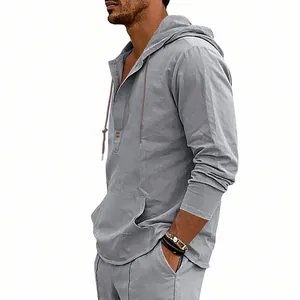 Men's breathable linen hooded Henley shirt in light gray with front kangaroo pocket.