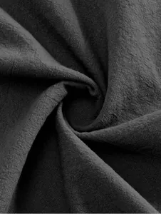 Close-up detail of high-quality dark grey cotton-linen fabric texture for men's casual shirt