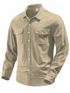 Macro view of khaki fabric texture and pocket detail on a men's long-sleeve casual shirt