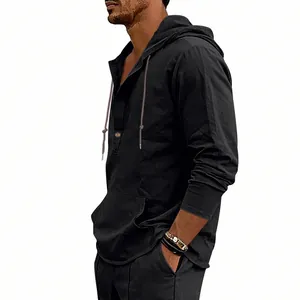 Detail view of men's black linen long sleeve hooded Henley shirt for casual wear