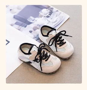 Close-up of breathable mesh toddler girl sneakers in German trainer style