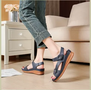Comfortable blue platform wedge sandals for women featuring elegant floral decorations