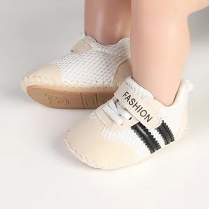 Close-up of breathable mesh baby walking shoes with soft sole and striped design