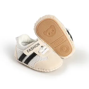 Close-up of beige baby walker shoes featuring breathable mesh and panda rubber sole