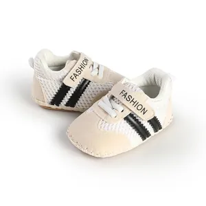 Close-up detail of beige breathable mesh baby walking shoes with fashion straps