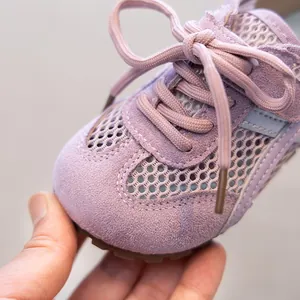 Detail view of breathable purple mesh sneakers for girls in retro trainer style