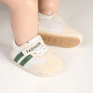 Breathable mesh baby walking shoes with soft non-slip sole and stylish green stripes