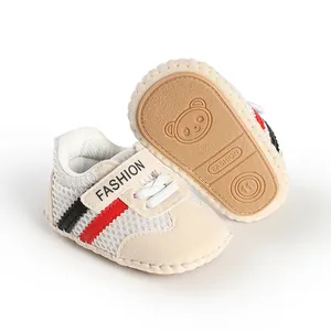 Detail view of breathable baby toddler shoes with striped design and soft sole