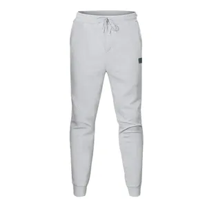 Vista frontal de joggers grises con textura para hombre con cordón y puños de canalé