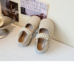 Elegant beige girls' Mary Jane shoes with double-row pearl straps and bow detail