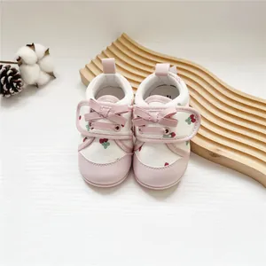 Soft sole baby girl walking shoes with cute pink bows and cherry strawberry print design