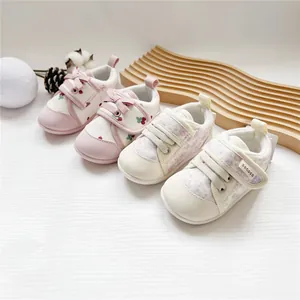 Soft sole baby girl walking shoes with floral and strawberry patterns and Velcro straps