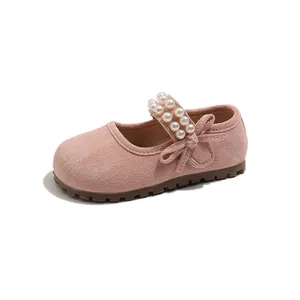 Elegant pink girl's princess shoes featuring a pearl strap and bow detail with a soft sole