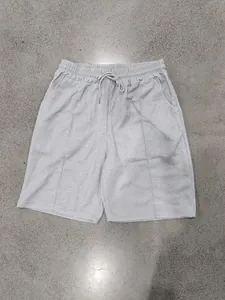 Détail du short de sport décontracté pour homme en maille gaufrée grise