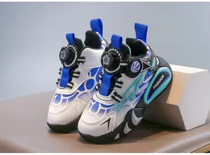 Detail view of boys' functional sneakers featuring a convenient rotating buckle closure.