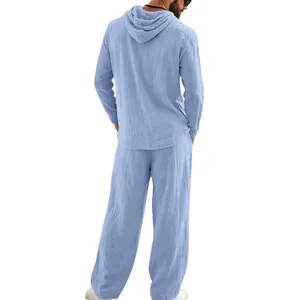 Back view showing the fit and hood detail of the light blue linen men's casual set
