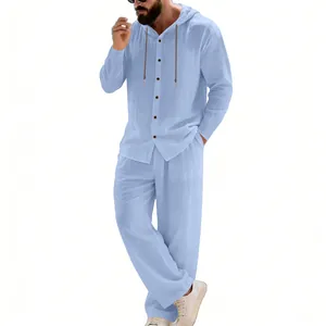 Close-up detail of light blue men's casual linen hooded shirt and straight pants set