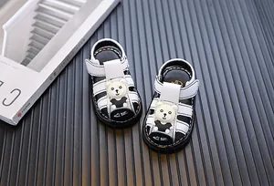 Infant boy closed-toe sandals with cartoon bear design and soft sole walking shoes