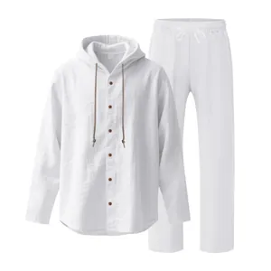 Men's white linen two-piece set with hooded button shirt and straight pants.
