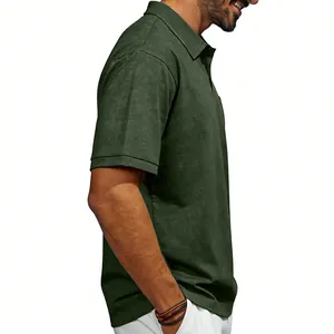 Side view of men's dark green distressed polo shirt with vintage texture