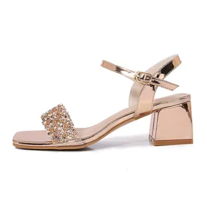 Elegant rose gold rhinestone sandals with block heel and adjustable ankle strap