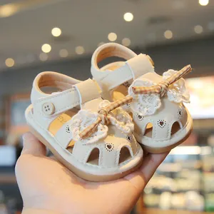 Cream baby summer sandals with lace bows and heart hollow-out soft soles for toddlers