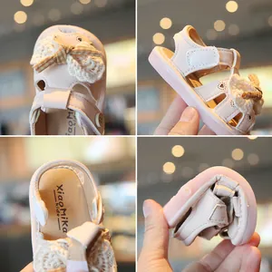Pink baby sandals with bow decoration and breathable soft sole for infants 0-2 years