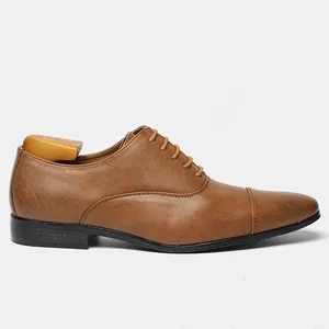 Detailed side profile of classic brown men's leather business Oxford dress shoes
